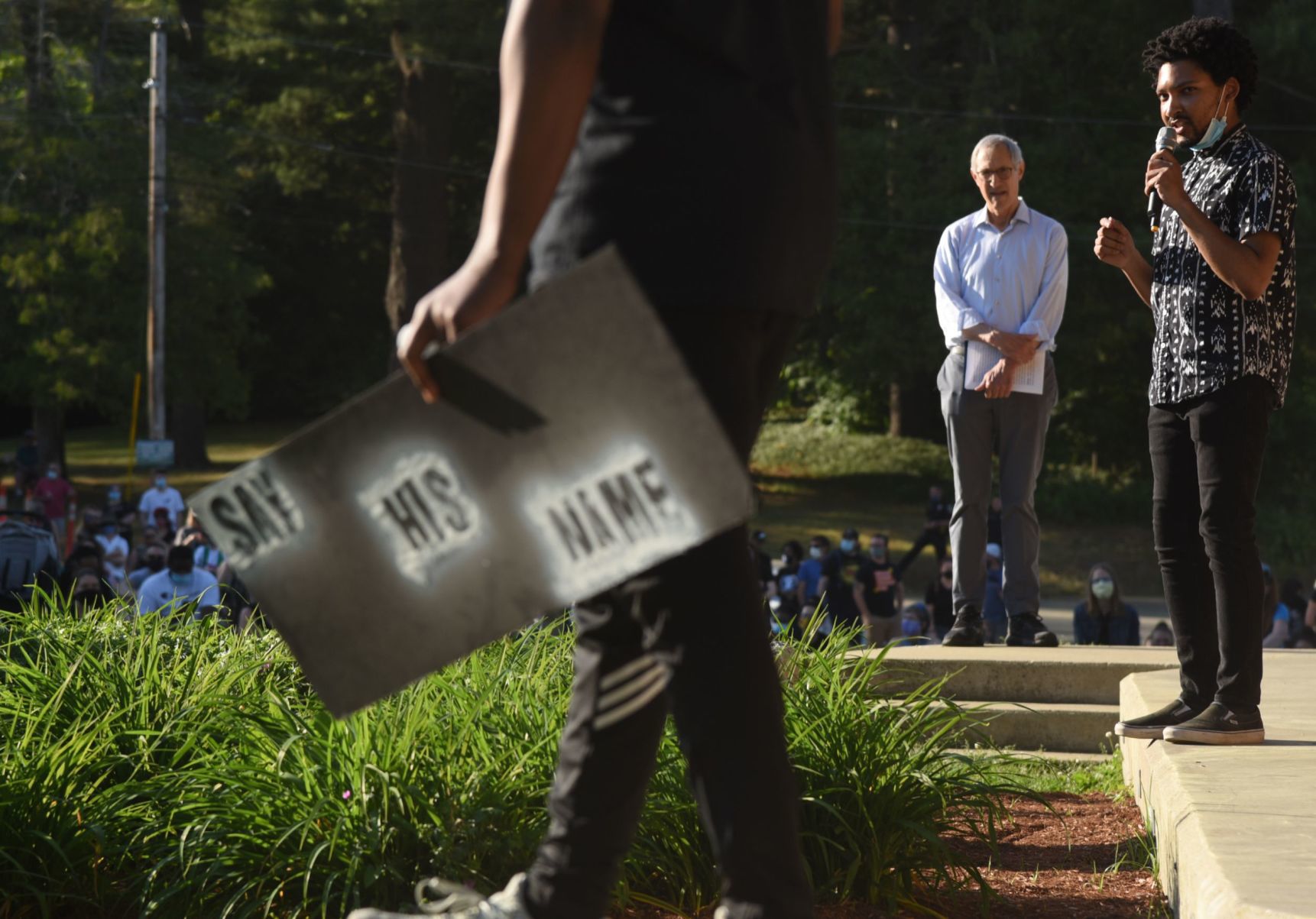 Jordan Thompson, right, speaks with Nashua Mayor Jim Donchess